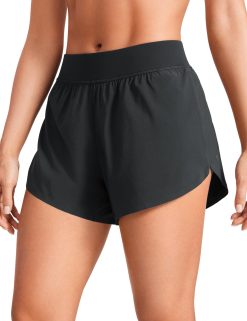 CRZ YOGA Mid Waisted Dolphin Athletic Shorts for Women 4" Lightweight High Split for Gym Workout with Liner Quick Dry Black Small