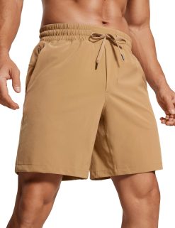 CRZ YOGA Men's Linerless Workout Shorts - 7'' Quick Dry for Running Sports Athletic Gym with Pockets Khaki Sand Medium